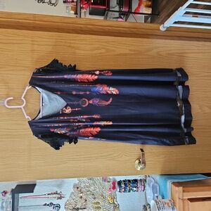 Black dress with feather design